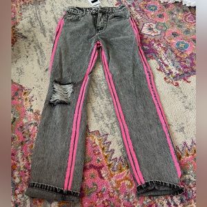 Black washed jeans with neon pink stripes, size small